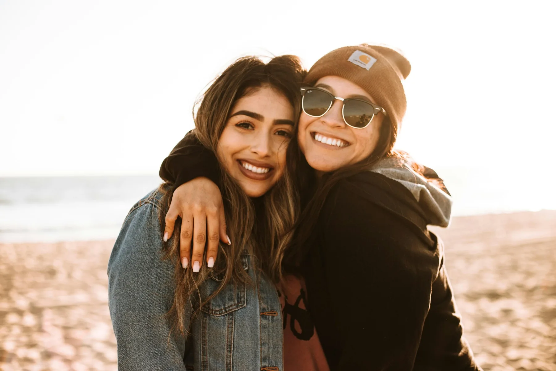 Two close friends smiling together